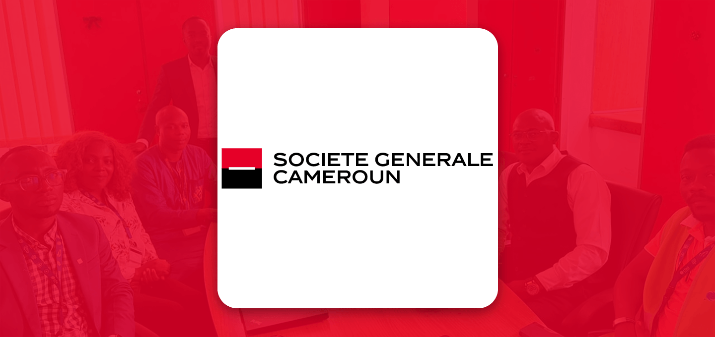 Société Générale Cameroun logo centered on a red-tinted background with people gathered in a meeting setting, conveying professionalism.